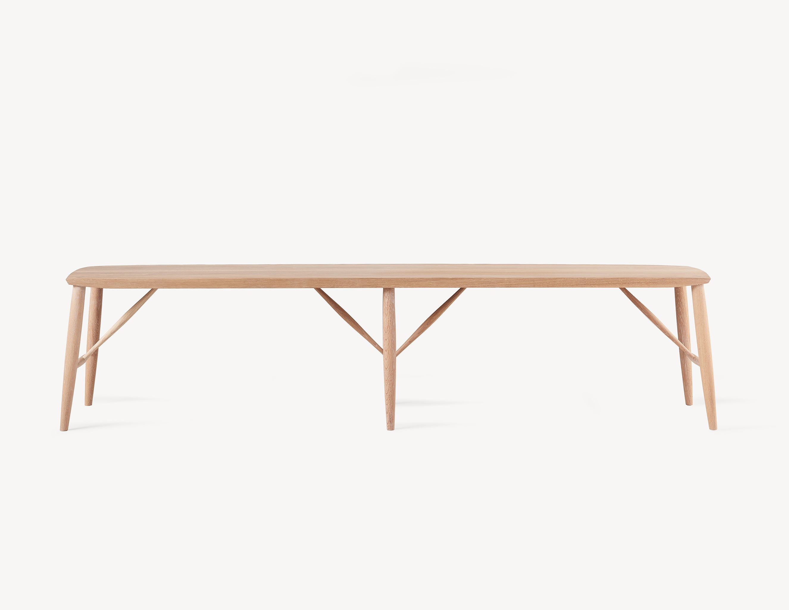 minimal wooden long oak bench in light wood.