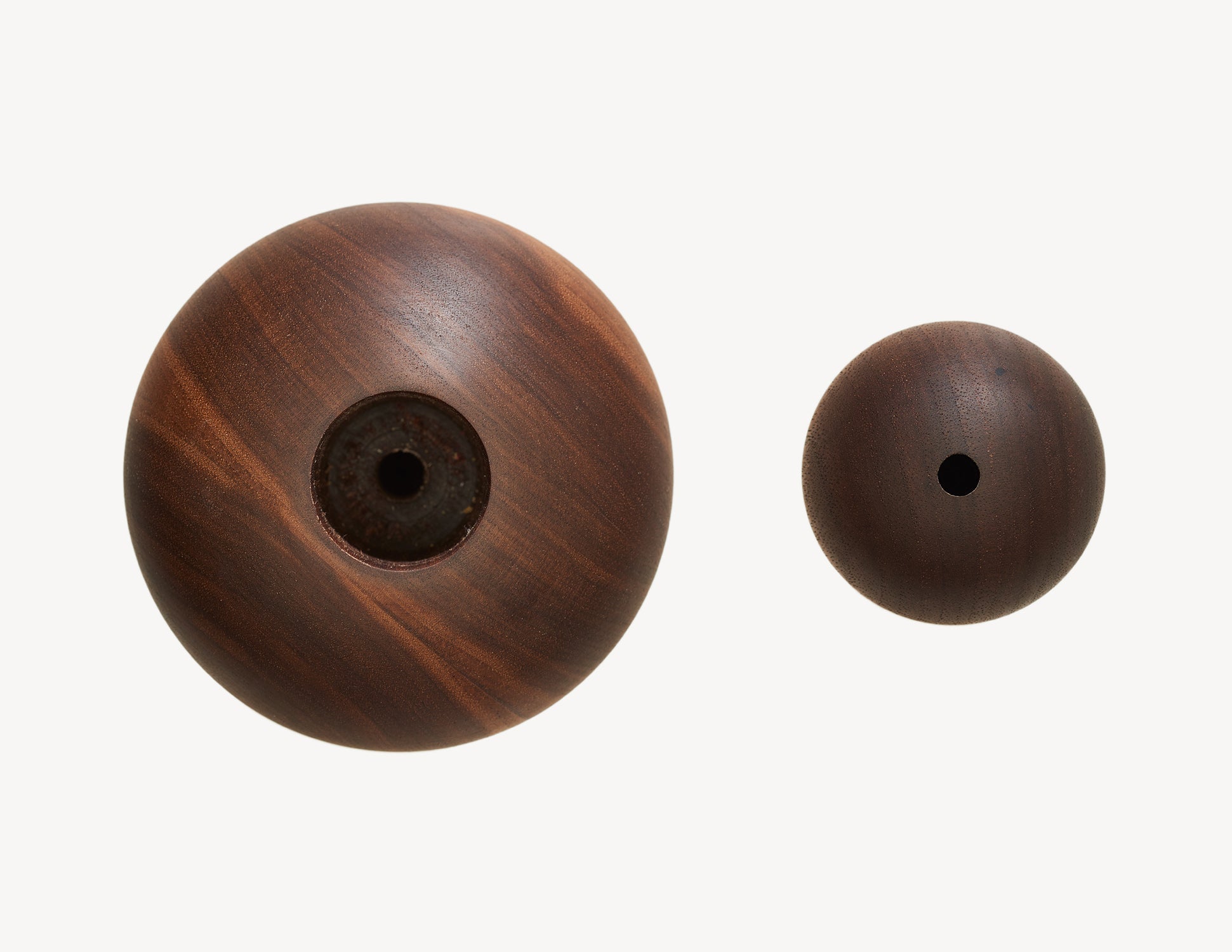 top view of two different wooden dry vases in walnut wood.